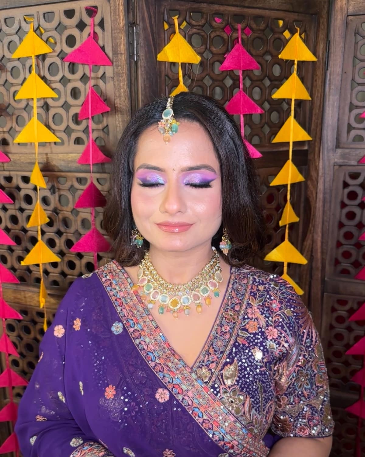 Iridescent Purple Eyes & Festive Mehendi Decor — bridal makeup by Makeovers by Bhuvita, Chandigarh